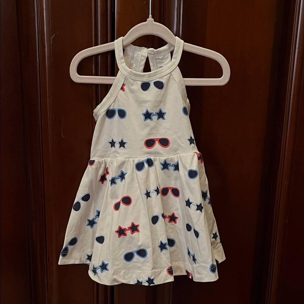 Adorable Cream Kids Dress with Star and Sunglasses Prints